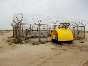 Fig. 2. A pump operating in the Arabian Desert, where peak temperatures exceed 122°F and blowing sand is relentless.