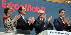 Exxon Mobil CEO Darren Woods (third from left)