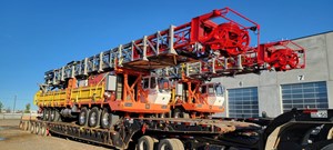 Fig. 1. Pictured in completed form at a Calgary yard, the two highly automated well servicing rigs are ergonomically designed and minimize manual labor. Image: Highwood Equipment Technologies Inc.