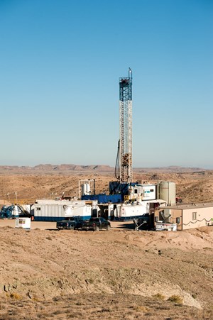 In a sign of better times, a Newfield Exploration rig makes hole in Utah’s Uinta basin during 2014. The independent has suspended all drilling activity in the Uinta this year. Courtesy of Newfield Exploration Co.