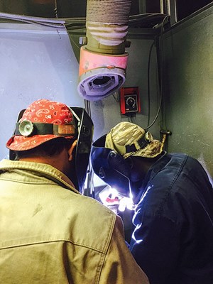 An instructor observes the handiwork of a student at the Sparx Welding and Technology Institute in Houma, La.