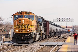 Having come off the CSX Transportation connection at Cicero, Ill. (near Chicago), an oil train heads west on the BNSF Railway through Berwyn, Ill., on March 14, 2015. Photo by David Lassen.