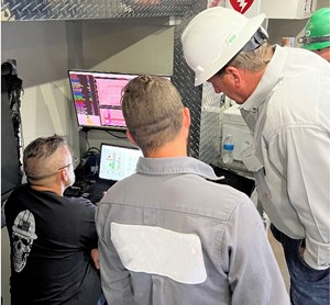 Fig. 14. Operator 2 personnel working the automated surface system from the frac van.