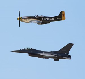 Fig. 3. On Sept. 16, 2017, Trent Latshaw and his P-51 participated with an Oklahoma National Guard F-16 fighter in a “heritage formation” flight. Photo: Latshaw Drilling.