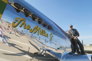 Fig. 2. Trent Latshaw stands on the wing of his prized P-51 Mustang, “The Millie G,” a premier World War II fighter plane. Photo: Latshaw Drilling.