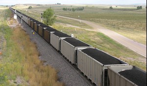 Fig. 1. A biomass-fueled power plant in England requires a volume of wood pellets carried by 475 railroad cars like these, each and every day. Image: Greg Goebel.