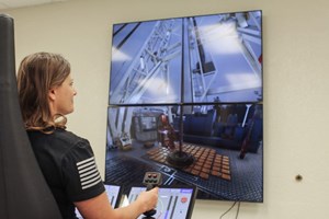 WTC Petroleum Technology Instructor Dana Fahntrapp demonstrates one of the new simulators for Well Control training.
